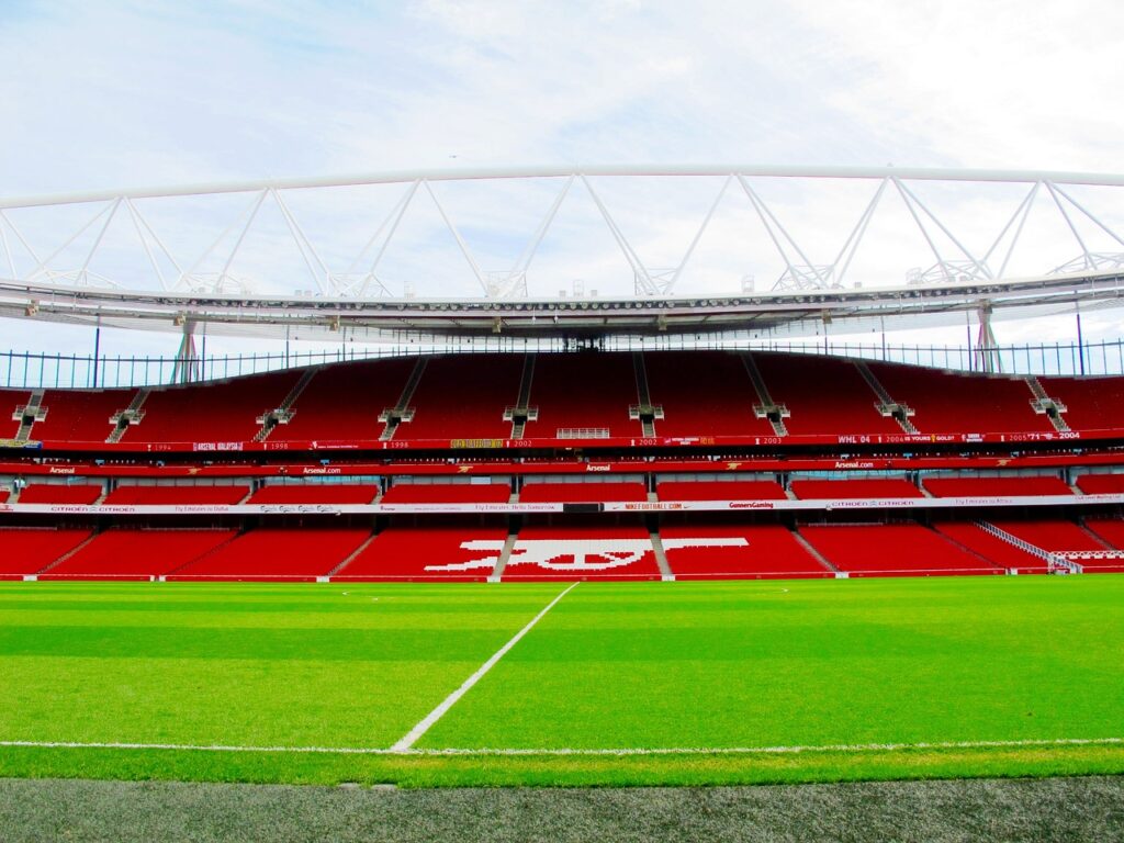arsenal squad depth problem — Emirates Stadium pitch empty before Premier League match
