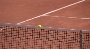 madrid open 2026 dark horses — red clay tennis court at La Caja Magica Madrid