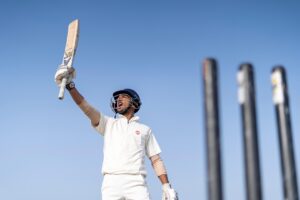 Cricketer playing on field in sportswear — ipl 2026 playoff scenarios