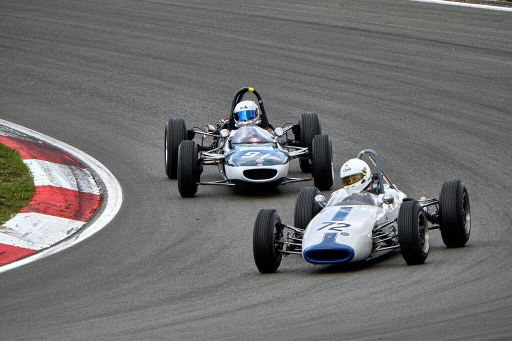 Formula 1 race car on track, evoking F1 constructor history