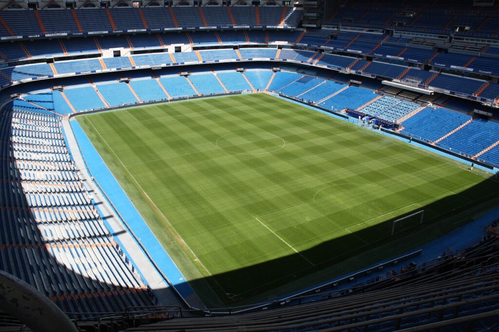 Rodri Real Madrid transfer analysis — stadium under Madrid night sky